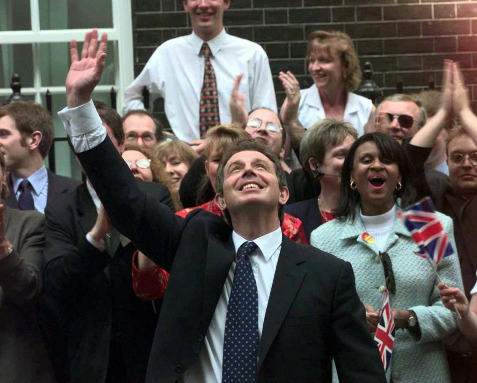 FILE - In this Friday, May 2, 1997 file photo, Britain's new Prime Minister Tony Blair, waves to wellwishers in Downing Street, London. Blair's Labour Party heavily defeated the Conservatives in Britain's General Election to end 18-years of Conservative rule. Blair will be Britain's youngest prime minister this century. Britain is facing the most testing and significant, some would say tortuous, period in its modern history since World War II. The polarized electorate now has a critical choice to make _but it seems unlikely the result, whatever it may be, will heal deep and toxic divisions that could last a generation or more. (AP Photo/Max Nash, file)