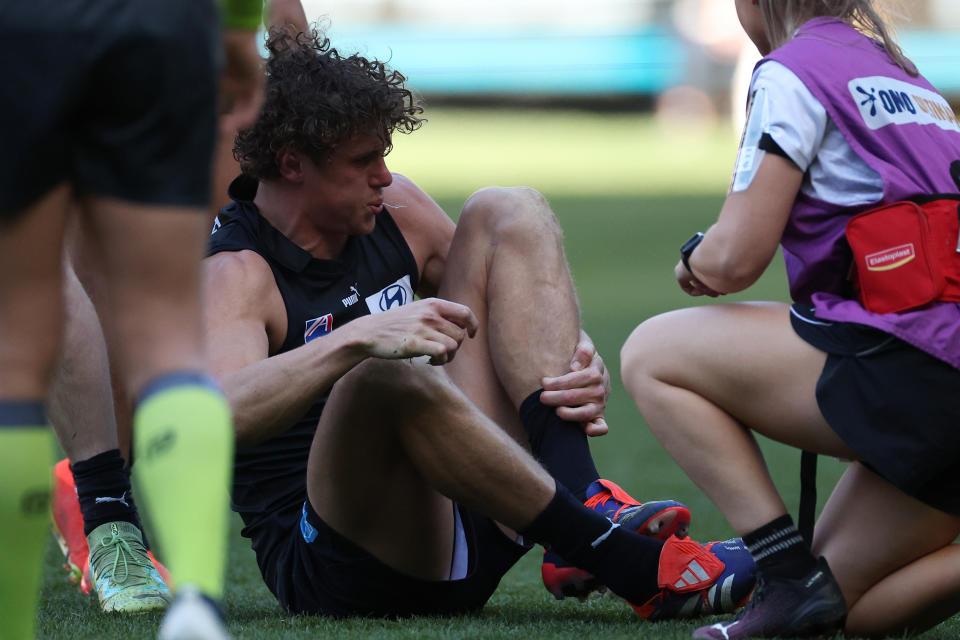 Charlie Curnow injured.