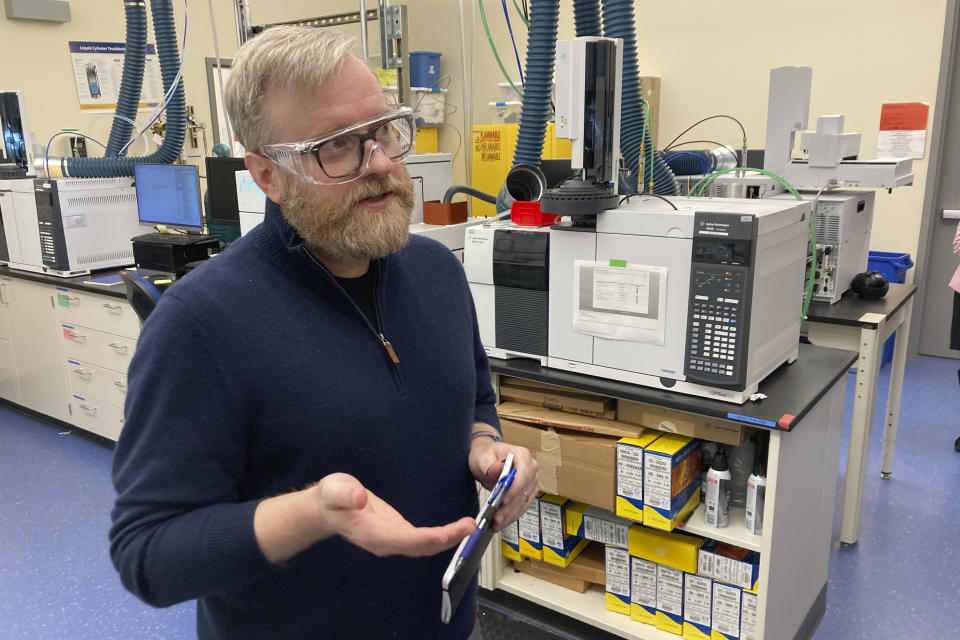 Ben Clark, senior vice president of engineering of Inpria, talks to journalists at the company's lab in Corvallis, Ore., on March 3, 2023. Inpria is developing a method to make semiconductor chips have greater functionality. Oregon wants to attract more semiconductor-related businesses to Oregon and state lawmakers are considering a bill that would allow the governor to expand urban growth boundaries for chip factories. (AP Photo/Andrew Selsky)