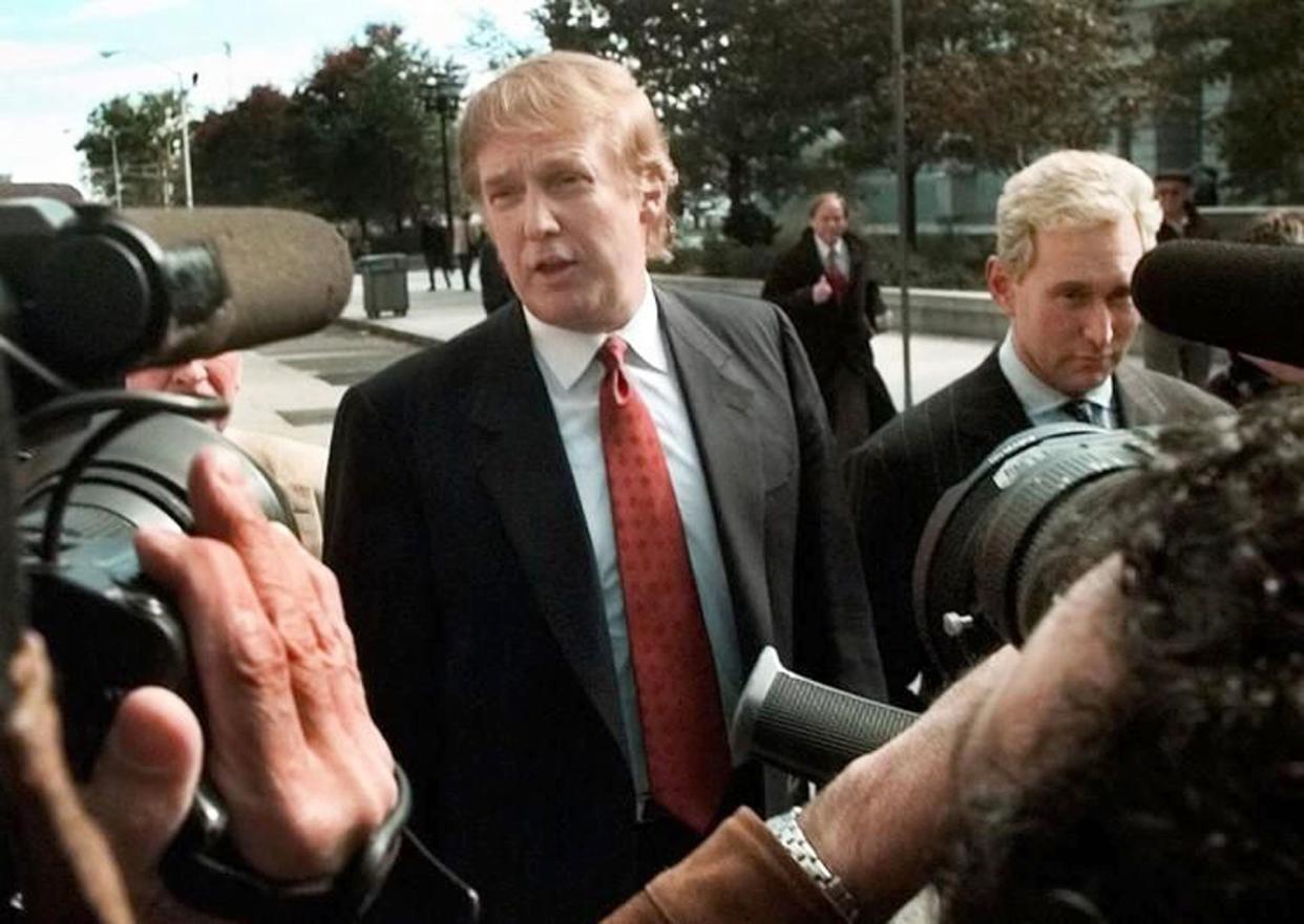 Developer Donald Trump, left, is seen outside the Federal Courthouse in Newark, N.J., with Roger Stone, the director of Trump's presidential exploratory committee on Monday, Oct. 25, 1999, for the swearing-in of Trump's sister as a federal appeals court judge.