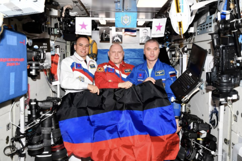 Russian cosmonauts Sergey Korsakov, Oleg Artemyev, and Denis Matveev hold the flag of the Donetsk People's Republic, a breakaway state formed by pro-Russian separatists in Ukraine, on the International Space Station. It is one of two such states, the second being the Luhansk People's Republic.