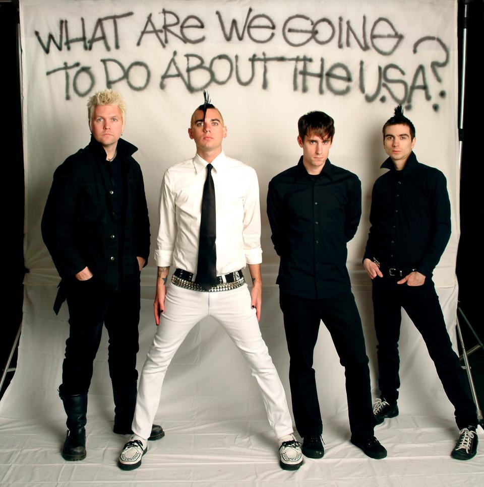 Anti-Flag members, from left, Pat Thetic, Chris Barker, Chris Head and Justin Sane.