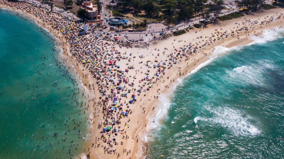 A bird's eye view of hundreds of people on a Rio beach on Sunday during the coronavirus pandemic.