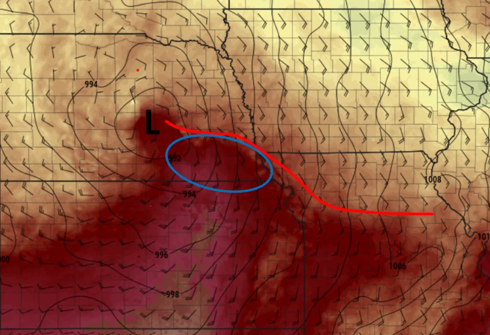 A chart map of wind direction and temperature shows the warm front across Nebraska and Iowa where the tornadoes developed.
