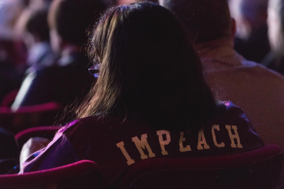 A guest in the audience wears an “Impeach” jacket, at “The People’s State Of The Union” at The Town Hall theater in New York City, NY, on Jan. 29, 2018. (Photo: Cheriss May/NurPhoto)