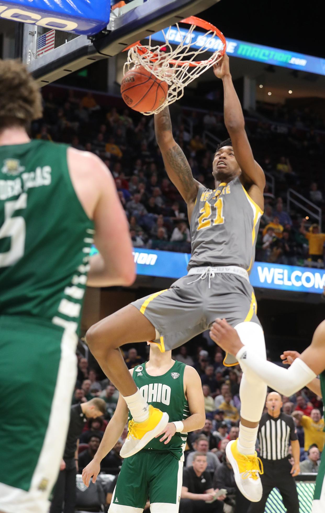 Kent State's Justyn Hamilton slams home a dunk against Ohio University in Friday's Mid-American Conference semifinal game on Friday March 11, 2022 in Cleveland, Ohio, at Rocket Mortgage FieldHouse. [Phil Masturzo/ Beacon Journal]