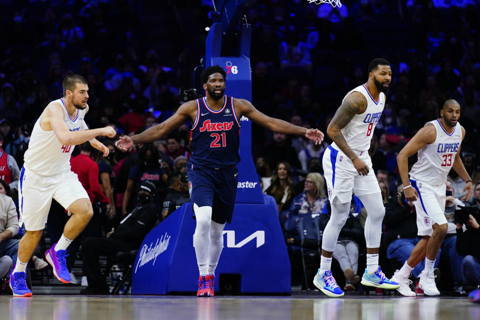 Philadelphia 76ers' Joel Embiid (21) reacts after not getting a foul call during the second half of an NBA basketball game against the Los Angeles Clippers, Friday, Jan. 21, 2022, in Philadelphia. (AP Photo/Matt Slocum)