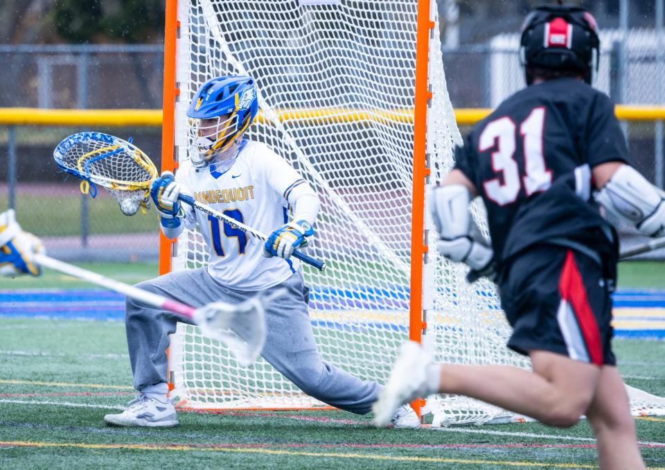 Irondequoit's Sven Habitzreuther makes a save.