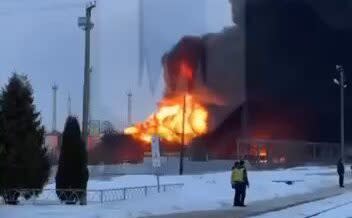 A Russian oil depot goes up in flames after a reported Ukrainian drone strike