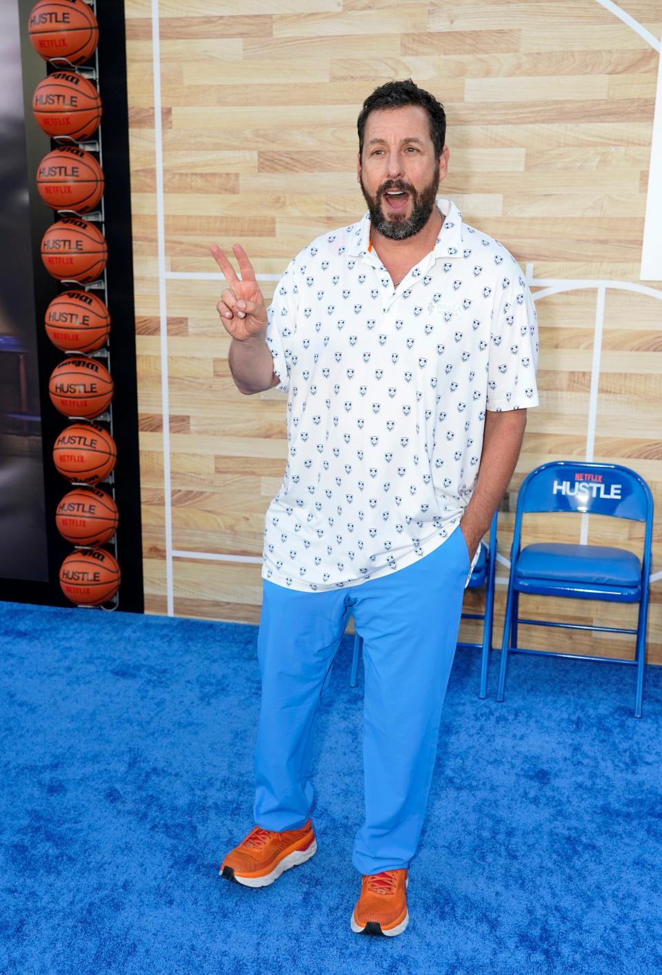 Adam Sandler, a cast member in the Netflix film "Hustle," poses at the premiere of the film, on June 1, 2022, at the Regency Village Theatre in Los Angeles.