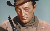 Er spielte Antihelden, Zyniker, Schurken, in Erinnerung blieb Robert Mitchum (Bild) vor allem aber auch als Westernheld: Zum 25. Todestag des US-Schauspielers, der am 1. Juli 1997 verstarb, blicken wir zurück auf die größten Stars der Western-Historie. (Bild: Getty Images / Sunset Boulevard)