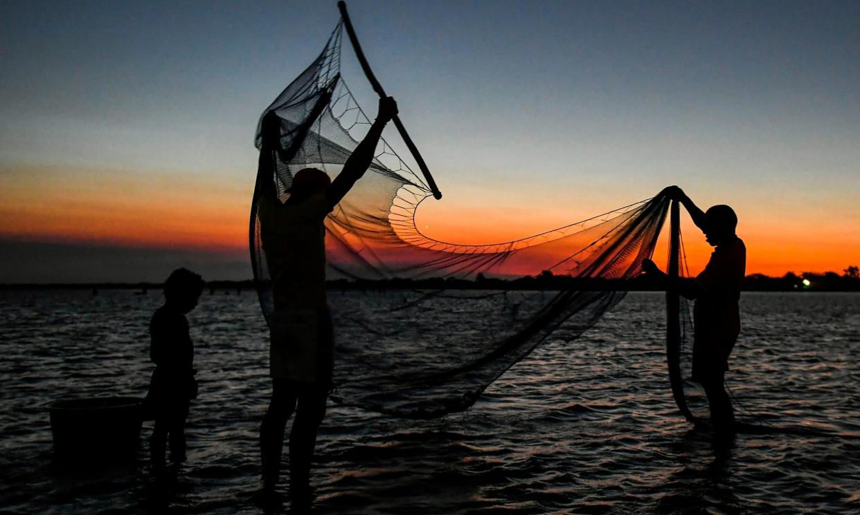<span>Fishers in Colombia. The country, with Chile, instigated the inter-American court of human rights inquiry.</span><span>Photograph: Luis Acosta/AFP/Getty Images</span>