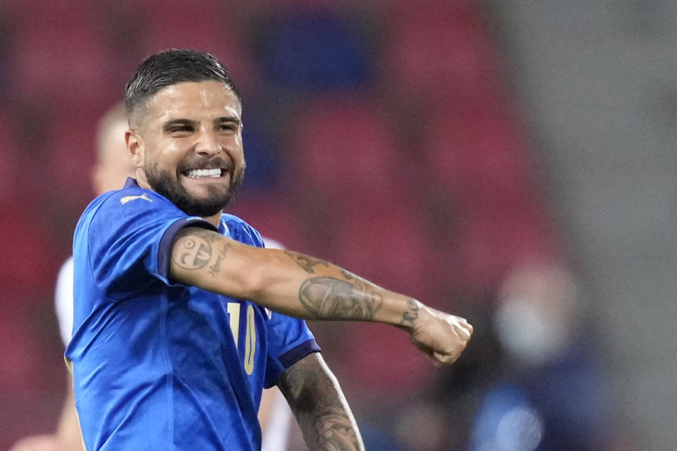 Italy's Lorenzo Insigne celebrates after scoring his side's third goal during the international friendly soccer match between Italy and Czech Republic in Bologna, Italy, Friday, June 4, 2021. (AP Photo/Antonio Calanni)