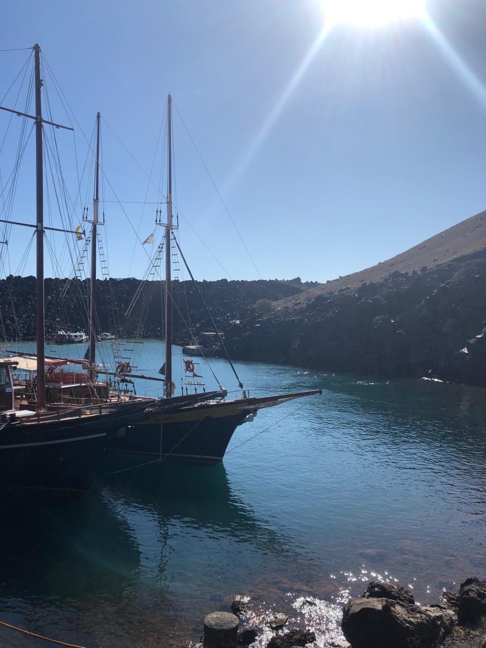 Boats docked at the volcanic islands