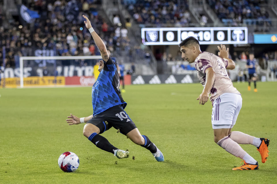 Portland Timbers defender Claudio Bravo, right fouls San Jose Earthquakes forward Cristian Espinoza (10) during the second half of an MLS soccer match in San Jose, Calif., Saturday, June 17, 2023. The game ended in a scoreless draw. (AP Photo/John Hefti)