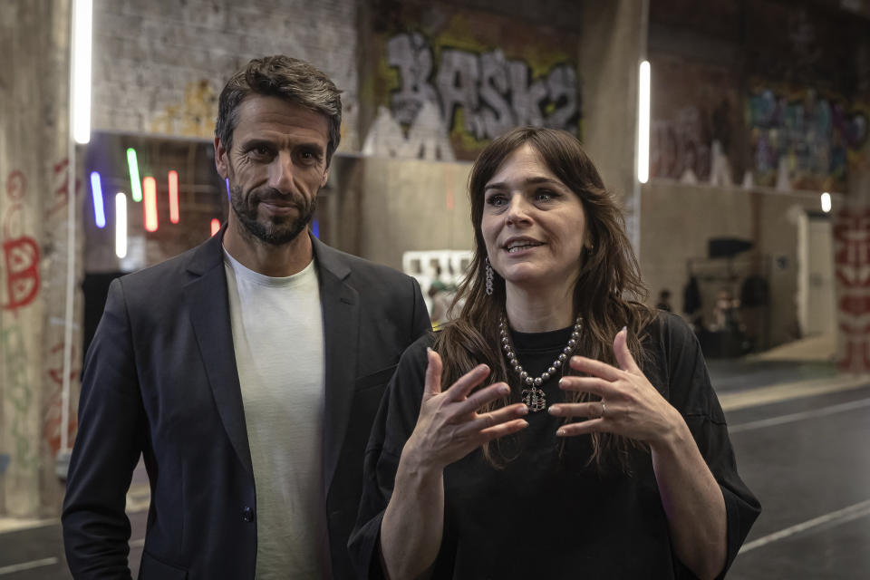 Olympics Dance Director Maud Le Pladec and Tony Estanguet, President of the Paris 2024 Olympic and Paralympic Games Organizing Committee, answer questions during a rehearsal for the Olympic Game opening ceremony, Friday, June 7, 2024 in Saint-Denis, near Paris. The troupe of dancers for the historic opening ceremony of the Paris 2024 Olympics—the first to be held outside a stadium—are putting the finishing touches on a high-octane performance that will combine urban, contemporary, classic, and break dancing, complete with stomps, shouts, and body rolls. (AP Photo/Aurelien Morissard)