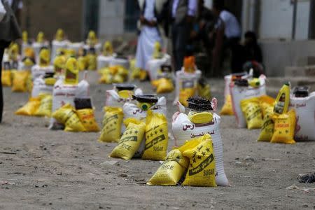 Food aid is lined for distribution by a local charity in Sanaa, Yemen, June 5, 2016. REUTERS/Khaled Abdullah/Files
