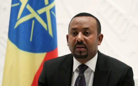 FILE PHOTO: Ethiopia's Prime Minister Abiy Ahmed speaks at a news conference at his office in Addis Ababa