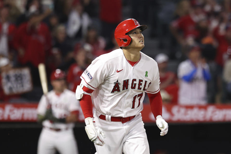 Los Angeles Angels designated hitter Shohei Ohtani (17) watches his home run during the sixth inning of a baseball game against the Minnesota Twins in Anaheim, Calif., Saturday, May 20, 2023. (AP Photo/Jessie Alcheh)