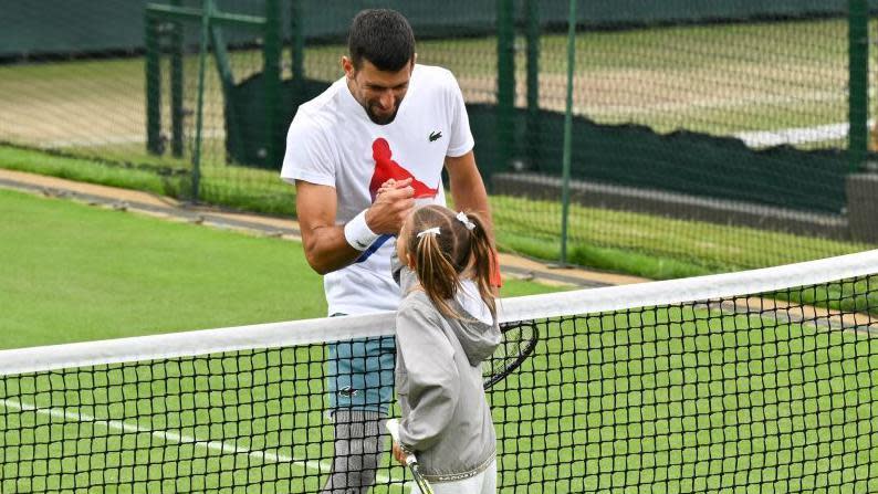Novak Djokovic with his daughter