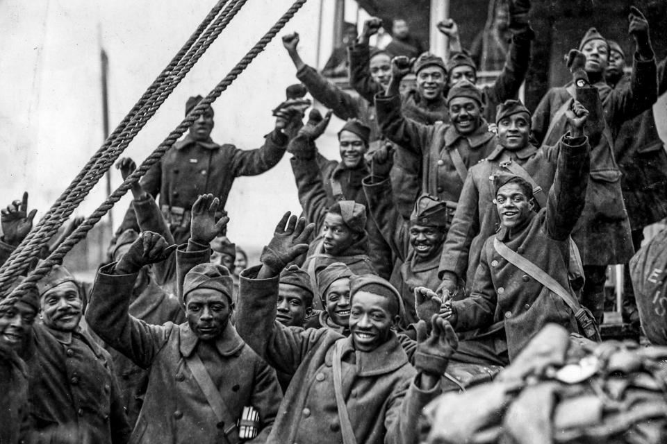 The all-Black 369th Infantry Regiment arrives in New York City, in 1919.