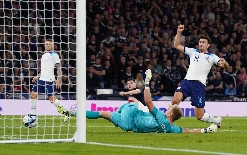 Harry Maguire scores an own goal during the international friendly match at Hampden Park, Glasgow