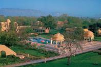 The Oberoi Rajvilas, India (Photo: Oberoi Hotels & Resorts) - Step back in time into a traditional fortified Rajasthani palace with lush gardens and cascading fountains at The Oberoi Rajvilas, Jaipur. Spread over 32 acres of luxurious verdant greenery, there are 54 Premier Rooms, 13 Luxury Tents (one Royal Tent), two Luxury Villas with private pools and one Kohinoor Villa with a private pool, each one decorated in colonial style.