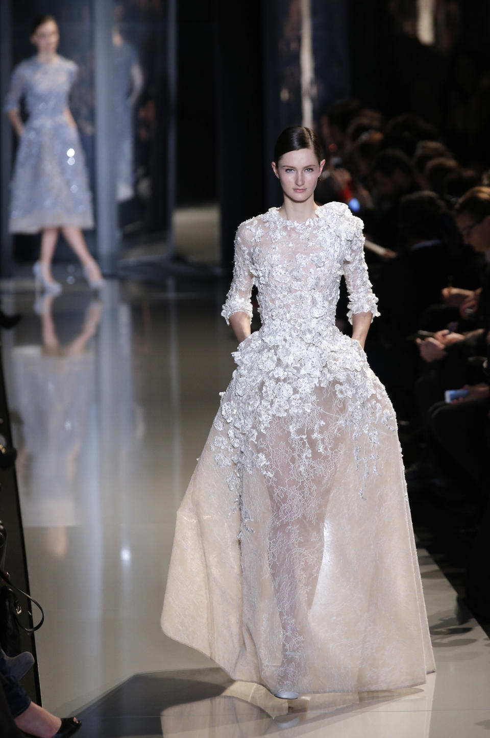A model wears a creation by Lebanese fashion designer Elie Saab for his Spring Summer 2013 Haute Couture fashion collection, presented in Paris, Wednesday, Jan.23, 2013. (AP Photo/Christophe Ena)