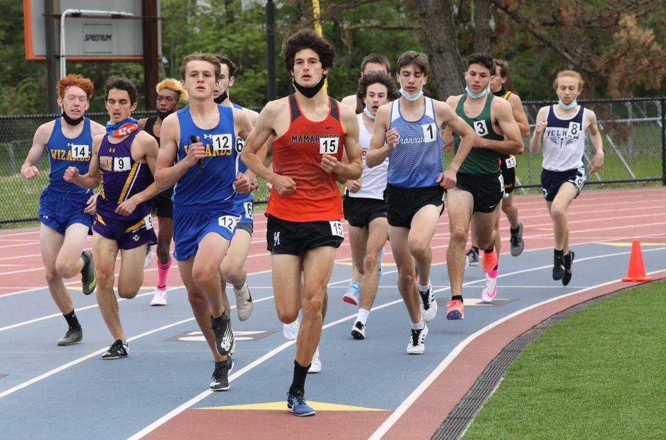 Mamaroneck's Matt Doherty, center, leads en route to winning the Loucks Games boys mile May 8, 2021. Doherty will compete in the boys 800 at this year's Loucks Games.