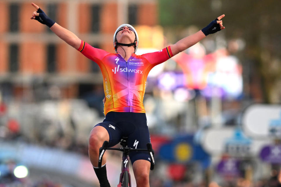 Lotte Kopecky celebrates her win in the 2023 Omloop Het Nieuwsblad