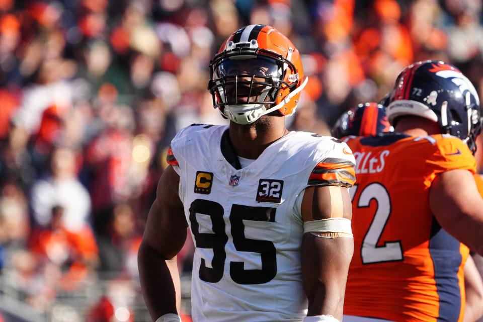 Myles Garrett waits during a first-quarter video review, Nov. 26, 2023, in Denver.