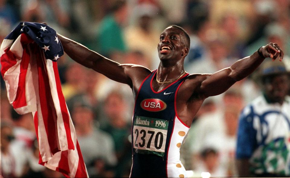 At the Atlanta Games of 1996, Michael Johnson shattered the 200-meter record and thrust himself into Olympic history all while wearing his golden shoes. The gold continued with another astonishing win at the 400-meter race. American track and field athletes continue to perform under the shadow of Johnson, his legacy, and his shoes. (AP Photo/Denis Paquin)
