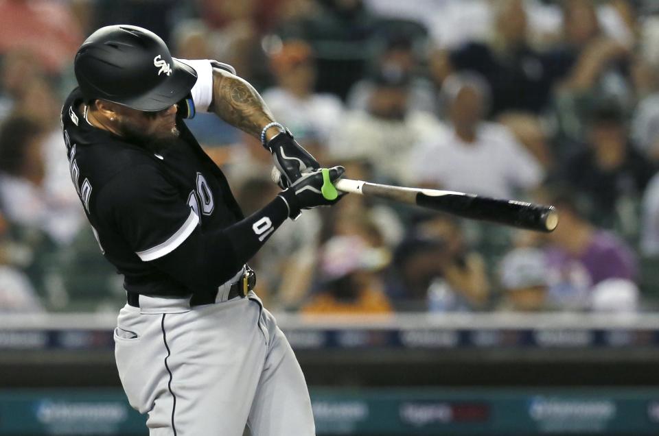 Chicago White Sox's Yoan Moncada singles to drive in Seby Zavala against the Detroit Tigers during the 11th inning of a baseball game Saturday, Sept. 17, 2022, in Detroit. (AP Photo/Duane Burleson)