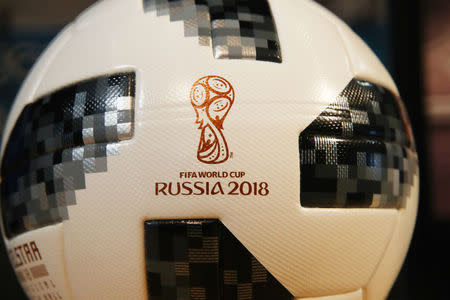 A soccer ball with the sign of the FIFA World Cup 2018 is seen before the Adidas annual news conference in Herzogenaurach, Germany March 14, 2018. REUTERS/Michael Dalder