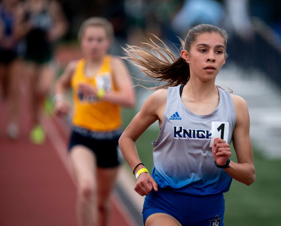 NolensvilleÕs Claire Stegall leads The Webb SchoolÕs Abby Faith Cheeseman in the 1600 meter run during the Great Eight Invitational 2024 at Franklin Road Academy in Nashville, Tenn., Thursday evening, April 25, 2024. Stegall finished first with a time of 4:35.36.