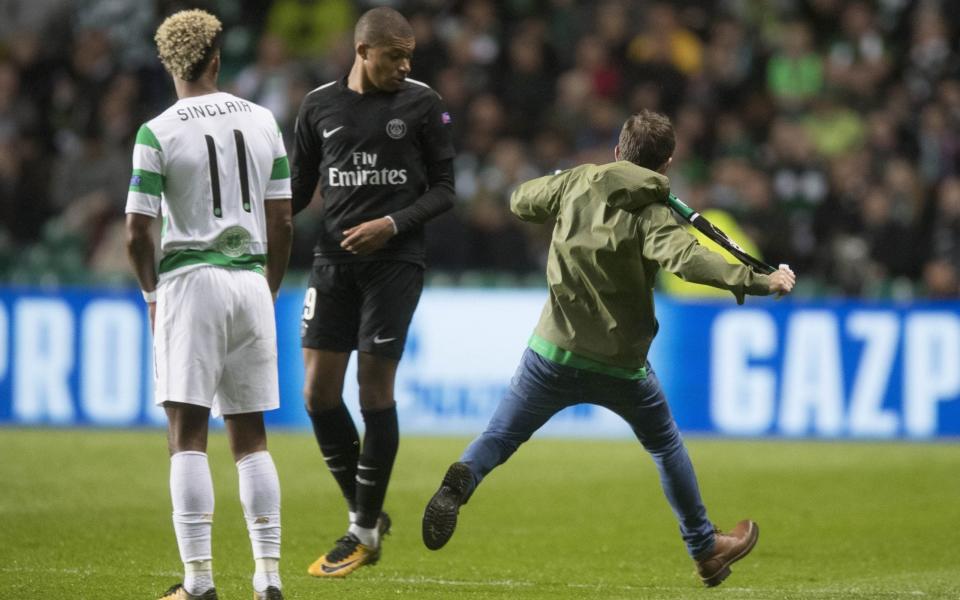 An pitch invader ran onto the pitch on Tuesday to confront Kylian Mbappé - Getty Images Europe