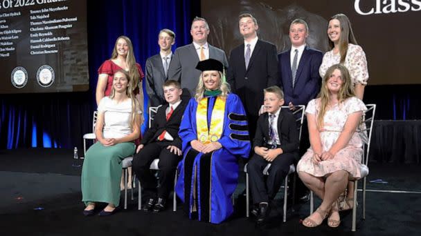 PHOTO: Dr. Sarah Merrill poses with her family at the Mayo Clinic Alix School of Medicine graduation on May 20, 2022. (Dr. Sarah Merrill)