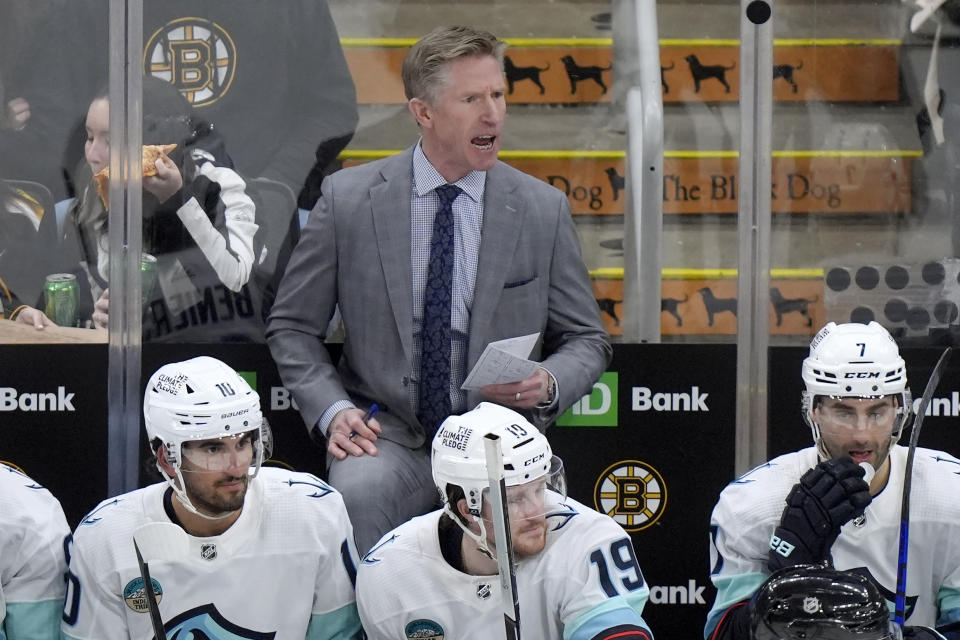 Seattle Kraken coach Dvae Hakstol shouts from behind the bench during the third period of the team's NHL hockey game against the Boston Bruins, Thursday, Feb. 15, 2024, in Boston. (AP Photo/Steven Senne)
