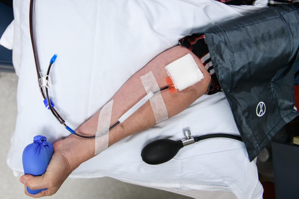 Chris Malloy donates platelets at Cape Fear Valley Blood Donor Center on Tuesday, Dec. 7, 2021.