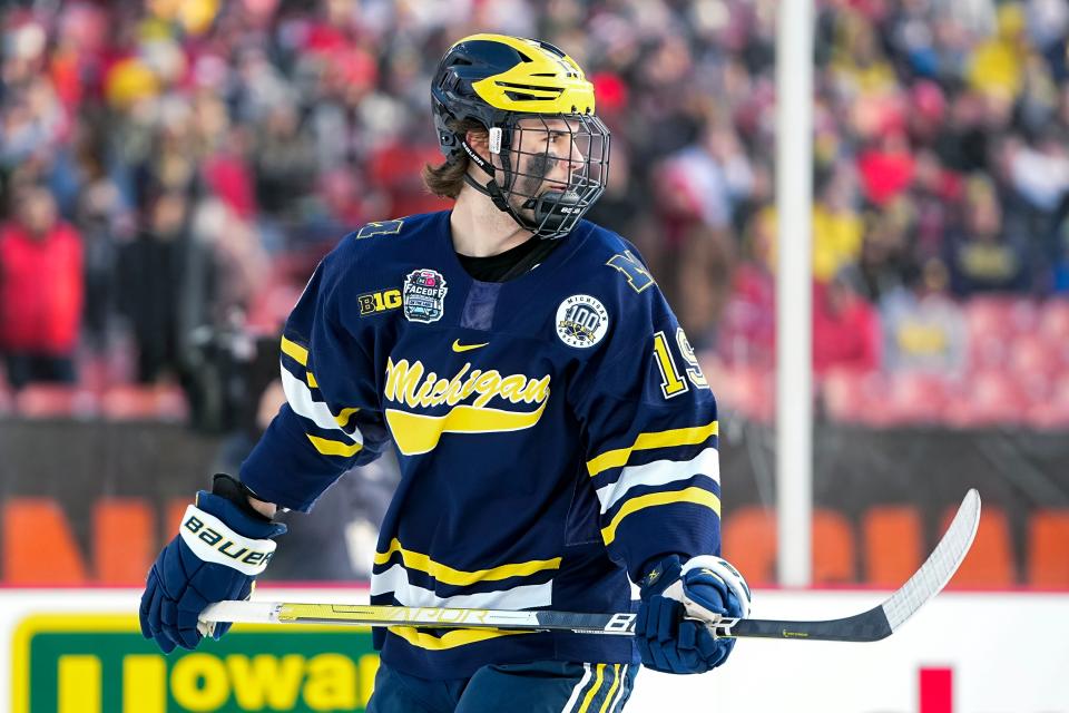 Feb 18, 2023; Cleveland, Ohio, USA;  Michigan Wolverines forward Adam Fantilli (19) skates during the Faceoff on the Lake outdoor NCAA men’s hockey game against the Ohio State Buckeyes at FirstEnergy Stadium. Mandatory Credit: Adam Cairns-The Columbus Dispatch