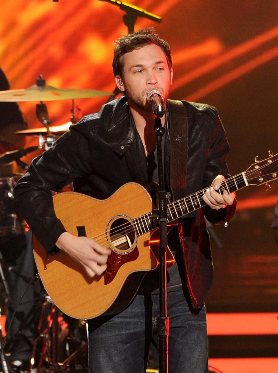 LOS ANGELES, CA - MAY 21: Musician Phillip Phillips performs onstage during Fox's "American Idol" XIII Finale at Nokia Theatre L.A. Live on May 21, 2014 in Los Angeles, California. (Photo by Kevin Winter/Getty Images)