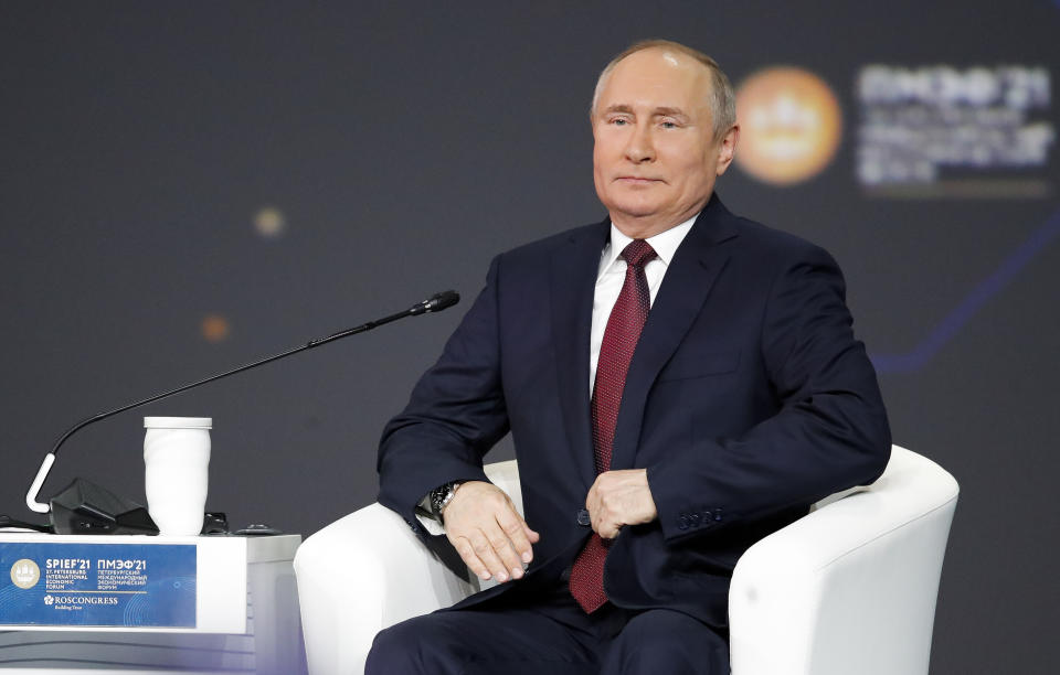 Russian President Vladimir Putin attends the St. Petersburg International Economic Forum in St. Petersburg, Russia, Friday, June 4, 2021. (AP Photo/Dmitri Lovetsky, Pool)