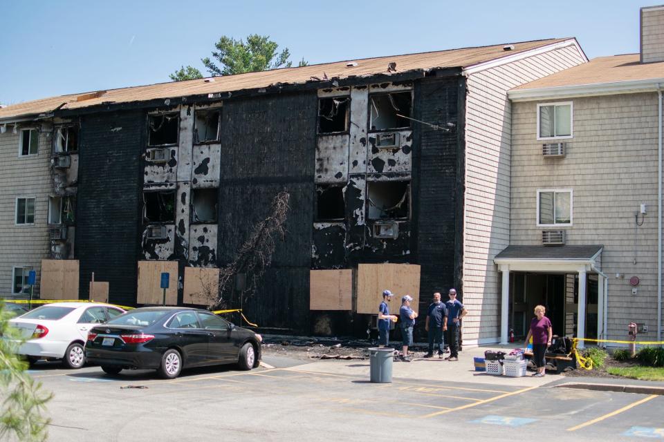The charred section of one building at an affordable senior housing complex in Johnston on Sunday afternoon. Six units were badly damaged by the fire, which displaced 52 residents and several pets.