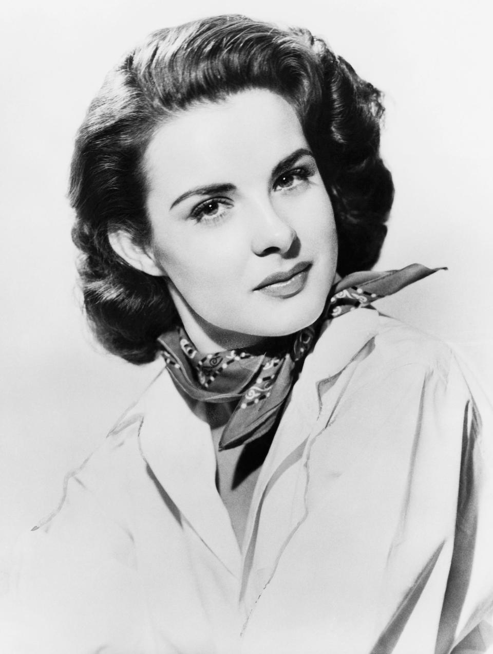 Head and shoulders portrait of Jean Peters, wife of Howard Hughes.