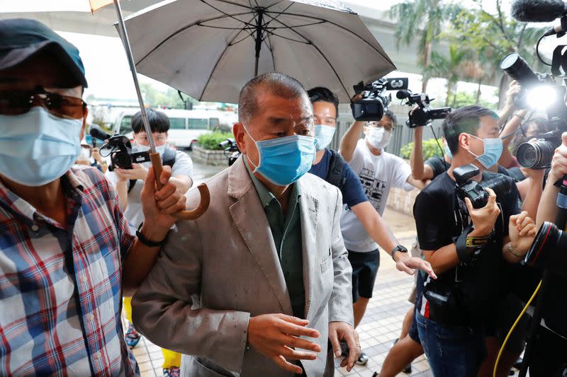 Media mogul Jimmy Lai Chee-ying, founder of Apple Daily, arrives at West Kowloon Magistrates' Courts, in Hong Kong