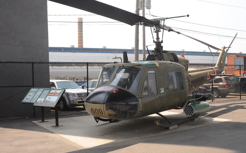 Battleship Cove is unveiling a new exhibit that will highlight two battle-tested helicopters that were used in Vietnam. The UH-1 Huey at Battleship Cove is seen in this Herald News file photo.