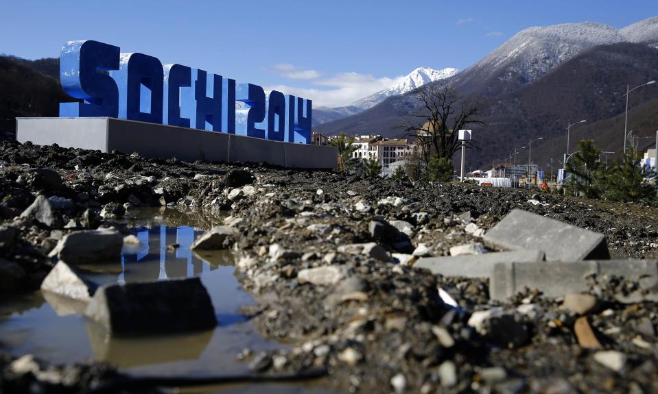 Mud is pictured in front of a Sochi sign near the village of Esto Sadok at the Rosa Khutor alpine resort near Sochi