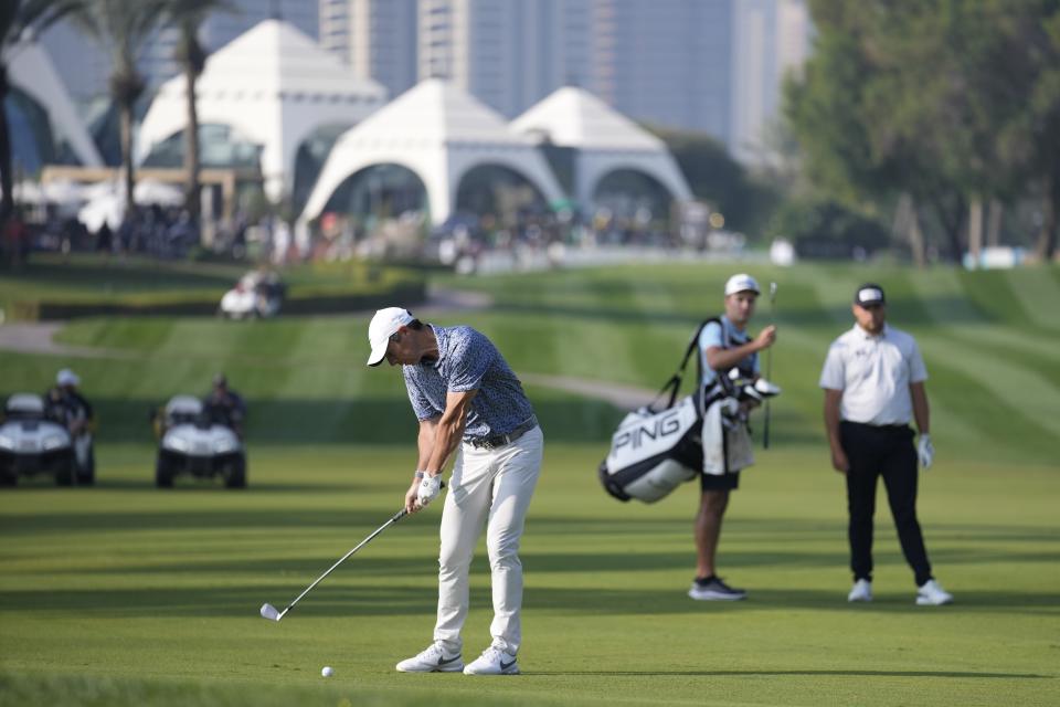 Rory McIlroy of Northern Ireland plays his second shot on the first hole during the final round of the Dubai Desert Classic, in Dubai, United Arab Emirates, Monday, Jan. 30, 2023. (AP Photo/Kamran Jebreili)