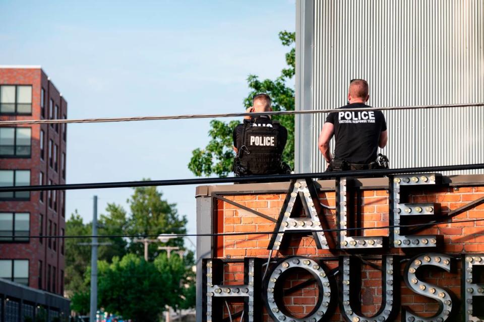 Kansas City Police Department snipers are engaged in a standoff at the 4100 block of Broadway Boulevard near Westport on July 1, 2022, in Kansas City.