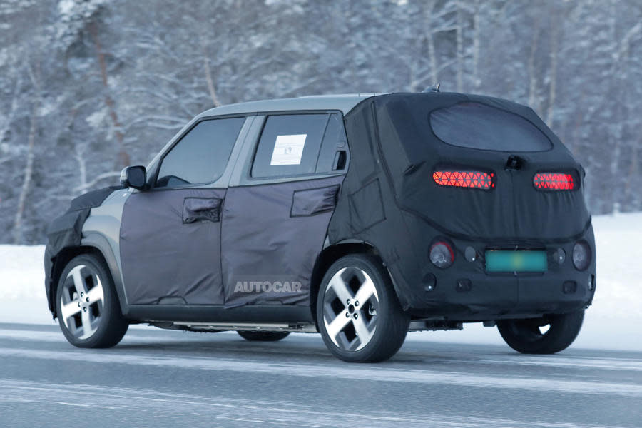 Hyundai Casper camouflaged driving rear quarter